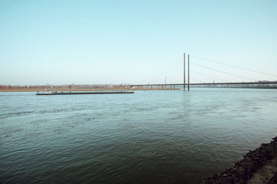 View of suspension bridge over river