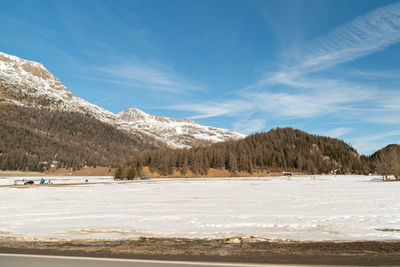 Silvaplana, switzerland, february 21, 2023 beautiful winter panorama at the lake of silvaplana