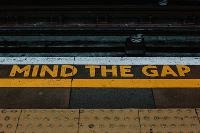 High angle view of text on railroad tracks