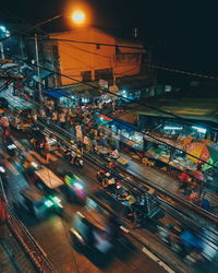 High angle view of illuminated city at night