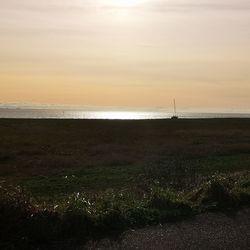 Scenic view of sea against sky during sunset