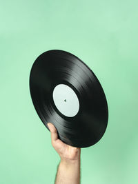 Hand holding vinyl record