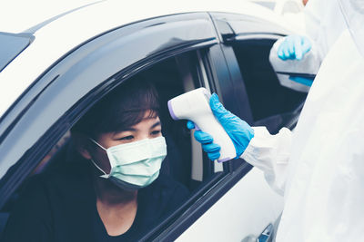 Portrait of man in car