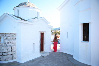 Low section of woman standing in church