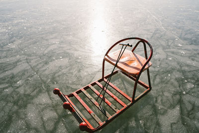 Sled on frozen lake