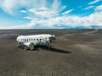 Aerial view of the old crashed plane abandoned on solheimasandur beach near vik,iceland.