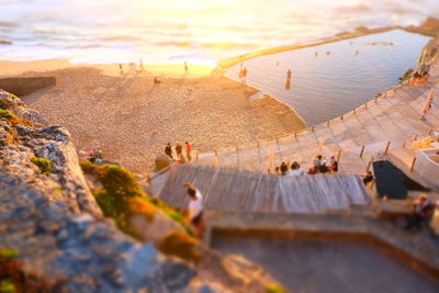 Flock of sheep against sky