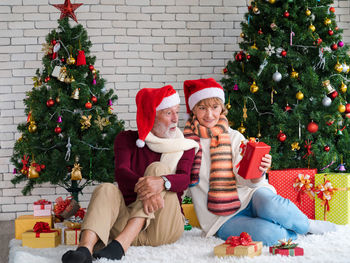 Group of people at christmas tree