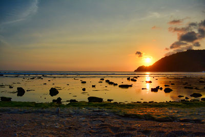 Scenic view of sea against sky during sunset