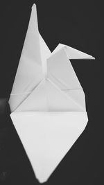 Close-up of paper against black background
