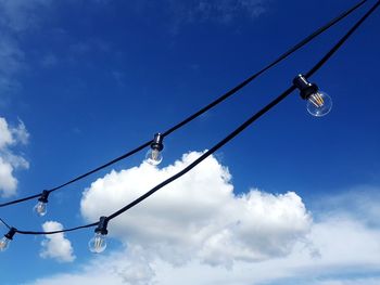 Low angle view of street light against sky