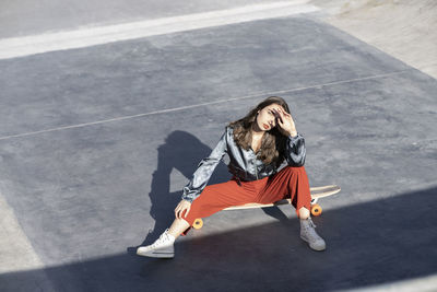 High angle view of woman looking at camera