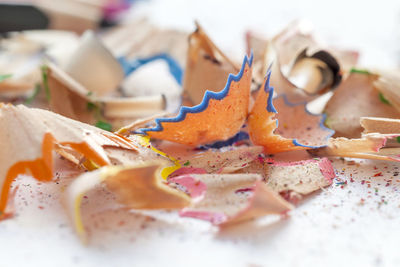Wood shavings from colorful pencils. back to school concept.