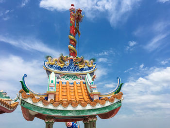 Low angle view of chinese bluilding against sky