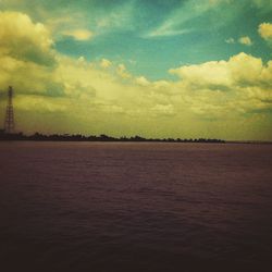 Scenic view of sea against sky at sunset