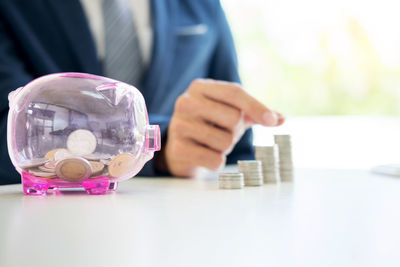 Close-up of a hand holding paper