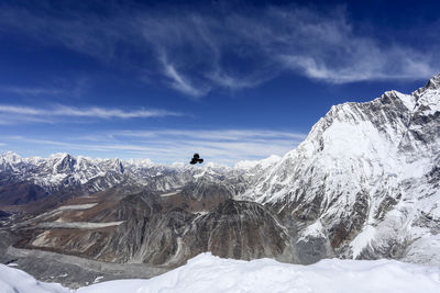 Scenic view of snow covered mountains