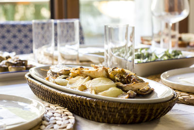 Close-up of served food on set table