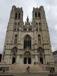 Facade of historic building against sky