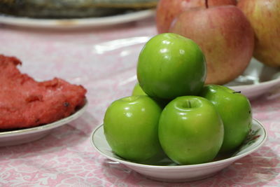 Close-up of fruits in bowl on table