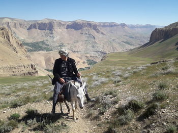 Man riding horse