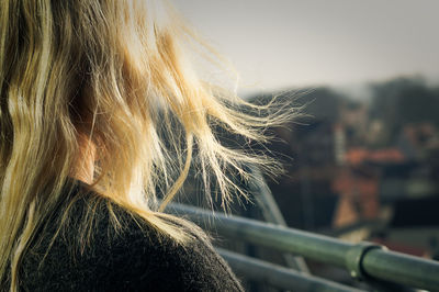 Cropped image of woman with blonde hair