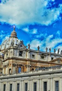 Low angle view of church against cloudy sky