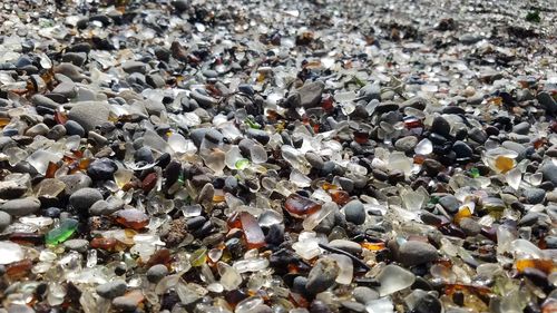 High angle view of stones on pebbles