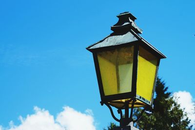 Low angle view of built structure against blue sky