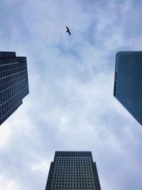 Low angle view of skyscrapers against sky