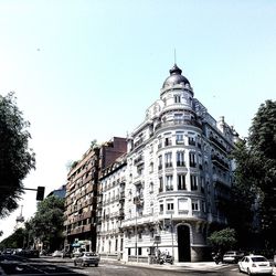 Low angle view of buildings against clear sky