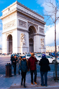 Group of people in front of historical building