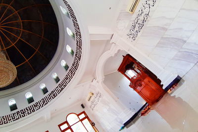 Low angle view of spiral staircase in building