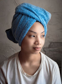 Portrait of cute girl with towel