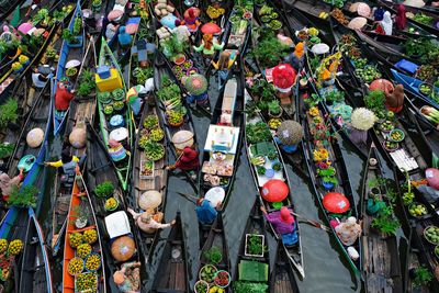 High angle view of multi colored boats in market