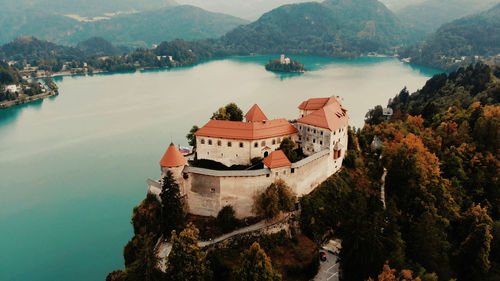 High angle view of buildings by sea