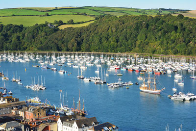 High angle view of boats sailing in sea against sky