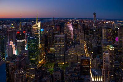 Illuminated cityscape at night