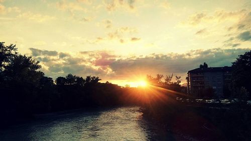 Scenic view of sunset over river