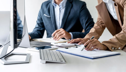 Business people working at desk in office