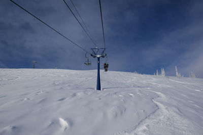 Sunny winter morning in the mountains of sheregesh on the ski track