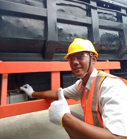 Portrait of man working at construction site