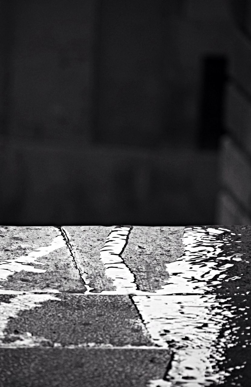 shadow, pattern, sunlight, water, tiled floor, flooring, indoors, reflection, built structure, wall - building feature, close-up, street, no people, high angle view, architecture, day, paving stone, cobblestone