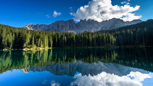 Carezza lake, mount latemar, bolzano province, south tyrol, italy. landscape of lake carezza