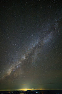 Low angle view of star field against sky at night