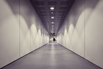 Empty corridor along walls