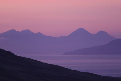 Scenic view of silhouette mountains against clear sky