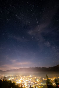 Scenic view of star field against sky at night