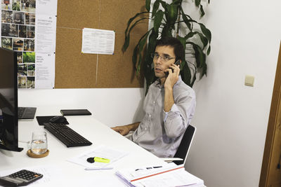 Man using laptop on table