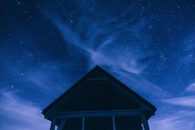 Low angle view of building against sky at night